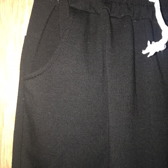 Sweatpants with white stripes on left leg - Picture 5 of 5